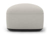 Byorne Low Back Stool in dusty teal, dark grey and pebble upholstery, featuring a compact sculpted form with a low contemporary profile. Built with high-density moulded foam and a welded steel internal frame for lasting comfort and structure, the stool is supported by injected-moulded nylon legs for stability. Designed to integrate seamlessly with other Byorne modular seating elements or function as a standalone piece in lounges, reception areas and modern hospitality interiors.