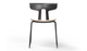 Okse Nord Stackable Chair on white background in black featuring a moulded PP-GF25 back, poplar plywood seat and powder-coated steel frame for durable, modern, space-efficient seating.