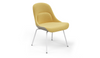 Bloom ergonomic office chair by Quell Design — yellow upholstered contoured seat with linen-velvet and eco PU panels, mounted on slender black steel legs with subtle wraparound support structure. Elegant and sculptural, the chair adds refined comfort and modern design to contemporary interiors.

