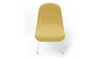 Bloom ergonomic office chair by Quell Design — yellow upholstered contoured seat with linen-velvet and eco PU panels, mounted on slender black steel legs with subtle wraparound support structure. Elegant and sculptural, the chair adds refined comfort and modern design to contemporary interiors.
